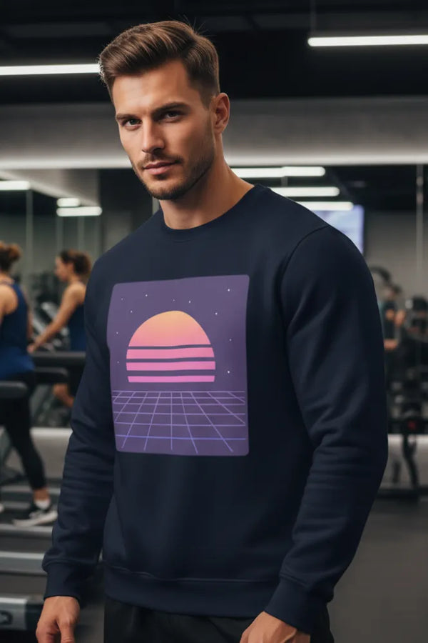 Man wearing a navy blue sweatshirt with a retro-themed graphic in a gym setting