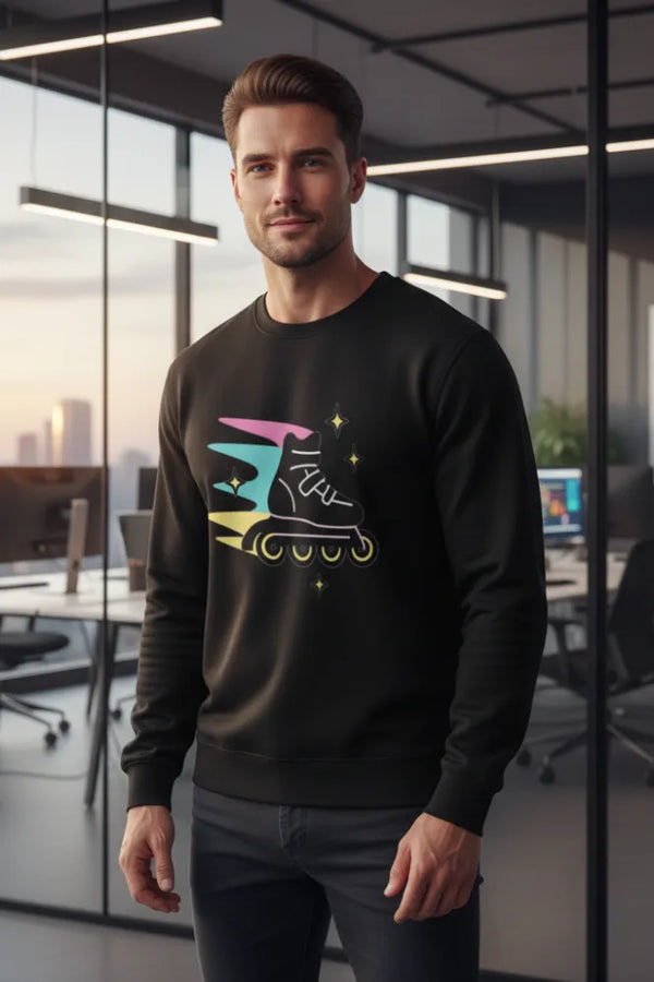 Man wearing a black sweatshirt with a colorful graphic design in an office setting