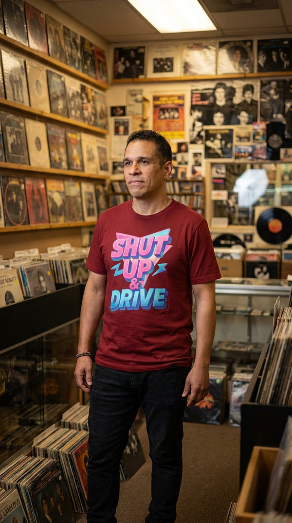 Organic Cotton Shut Up And Drive Tee - Female Model in Vintage Record Store - 90s Retro Sustainable