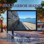Framed canvas print of Bar Harbor, Maine’s seawall overlooking the ocean with distant islands, captured from a scenic coastal walkway against a clear blue sky.