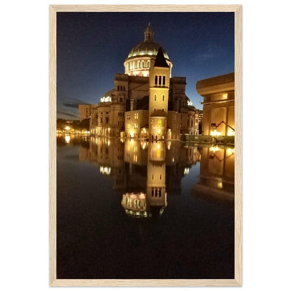 Stunning night reflection of a beautifully illuminated building on calm water, showcasing urban elegance and serene ambiance. Perfect for modern art and decor.