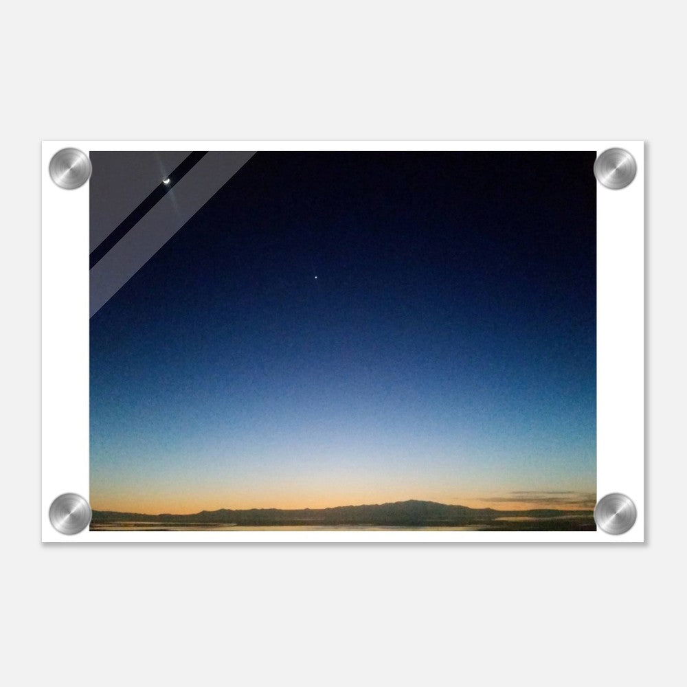 A breathtaking starlit horizon captured in vivid colors on a sleek acrylic print, perfect for modern and sophisticated wall art decor.