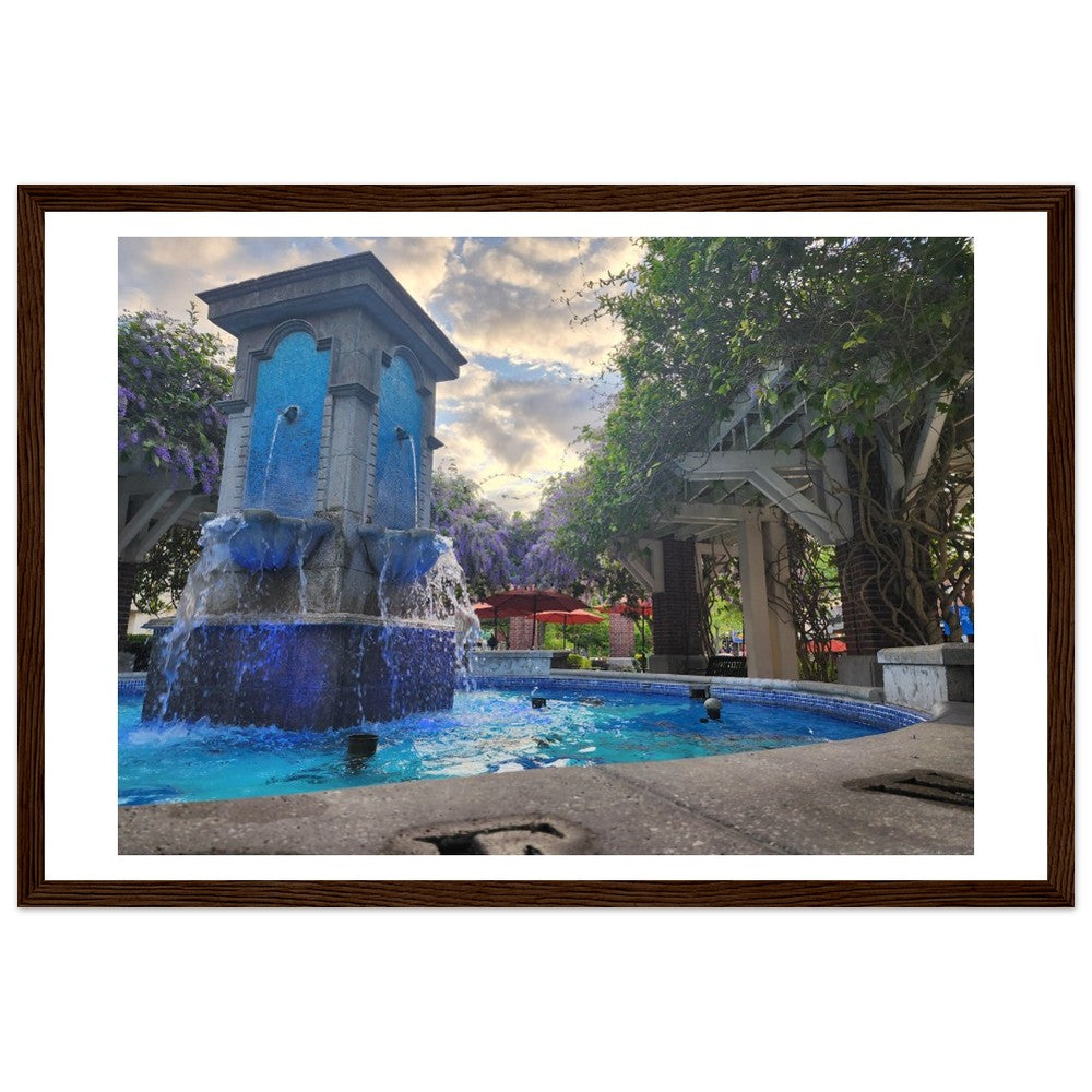 A serene water fountain set in a lush courtyard, exuding tranquility and natural elegance, ideal for peaceful outdoor or garden-inspired decor.