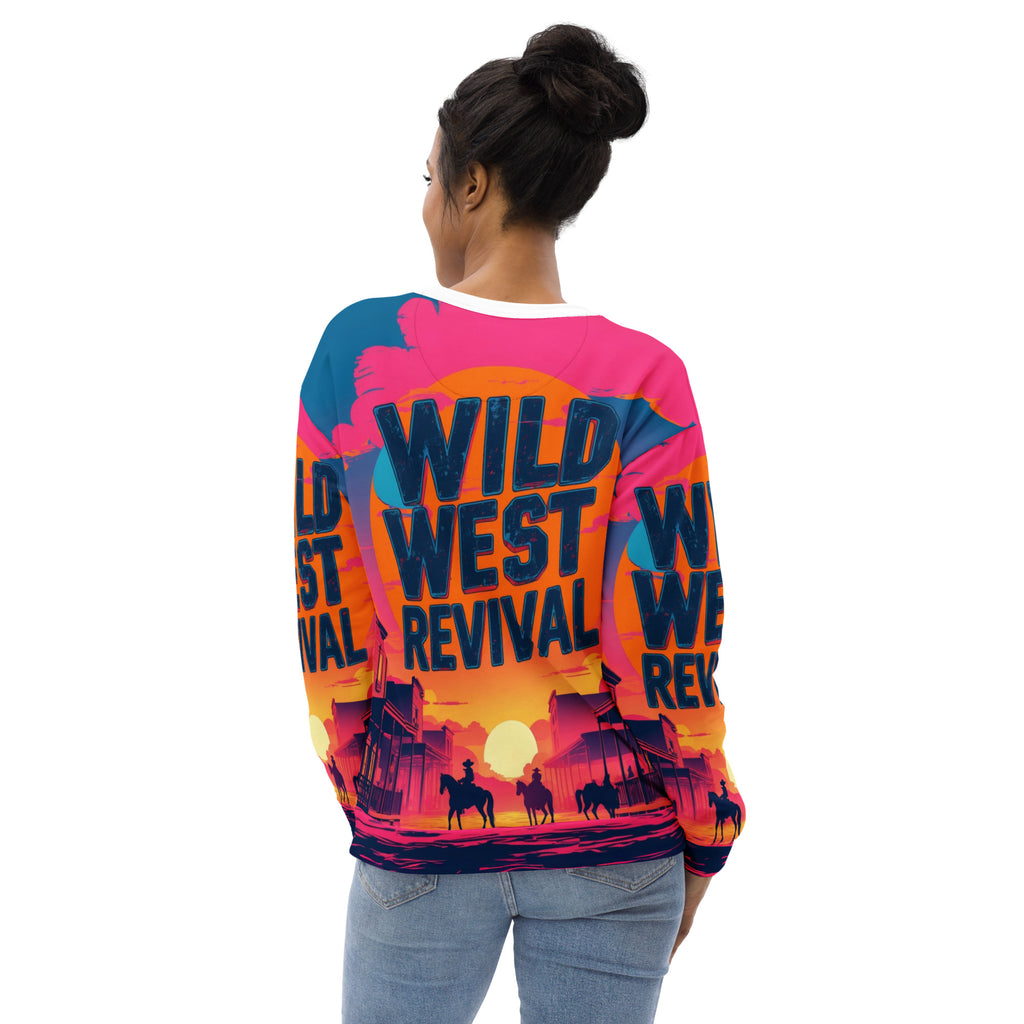 Person wearing a colorful 'Wild West Revival' sweatshirt with a sunset design on the back.