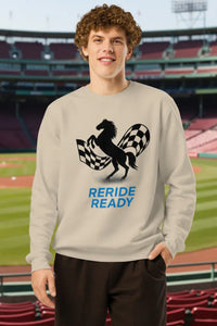 Person wearing a sweatshirt with a rooster graphic and 'RERIDE READY' text at a stadium.