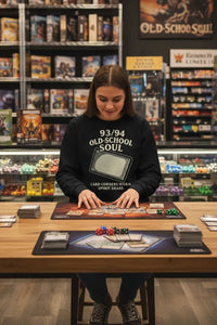 Woman playing a board game in a store with shelves in the background