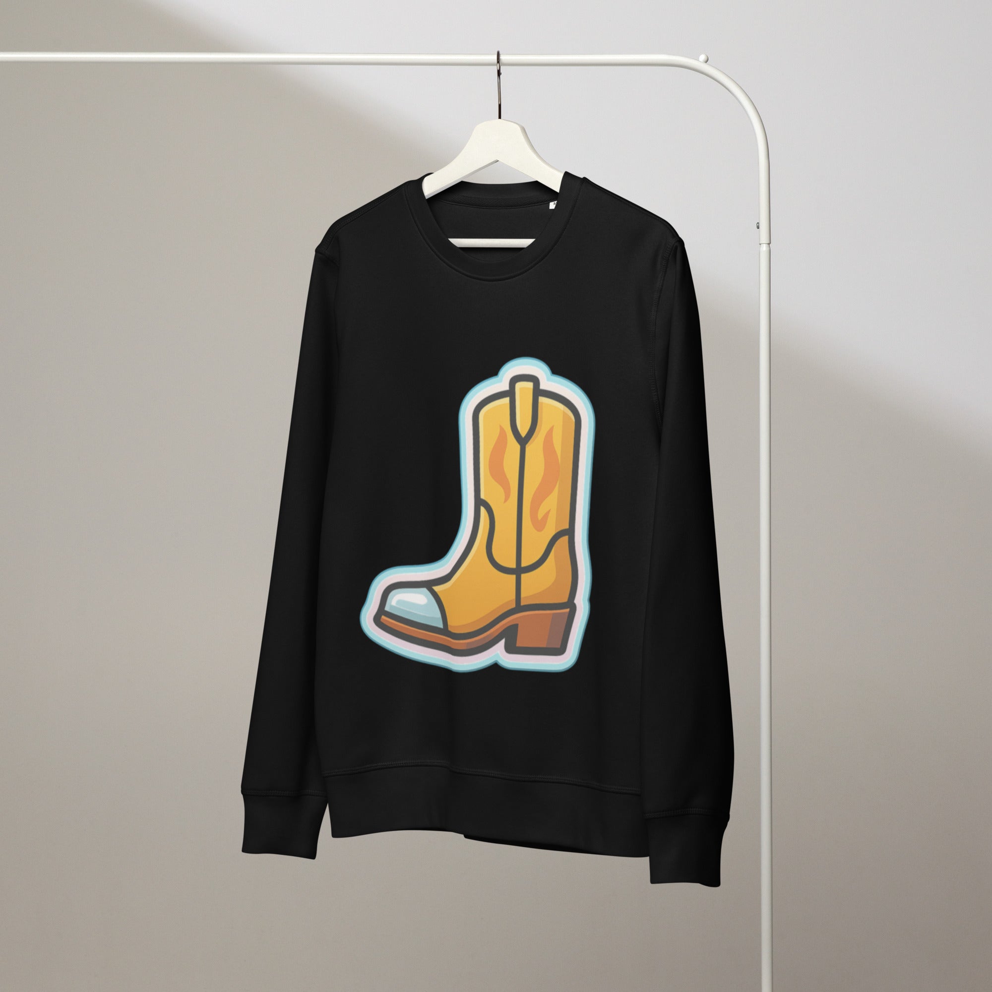 Black sweatshirt with a yellow cowboy boot graphic on a hanger against a plain background
