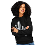 Woman wearing a black sweatshirt with a white cactus design on a white background