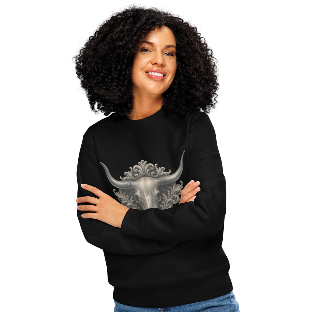 Woman wearing a black sweatshirt with a longhorn design on a white background