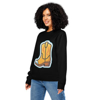 Woman wearing a black sweatshirt with a yellow boot graphic on a white background