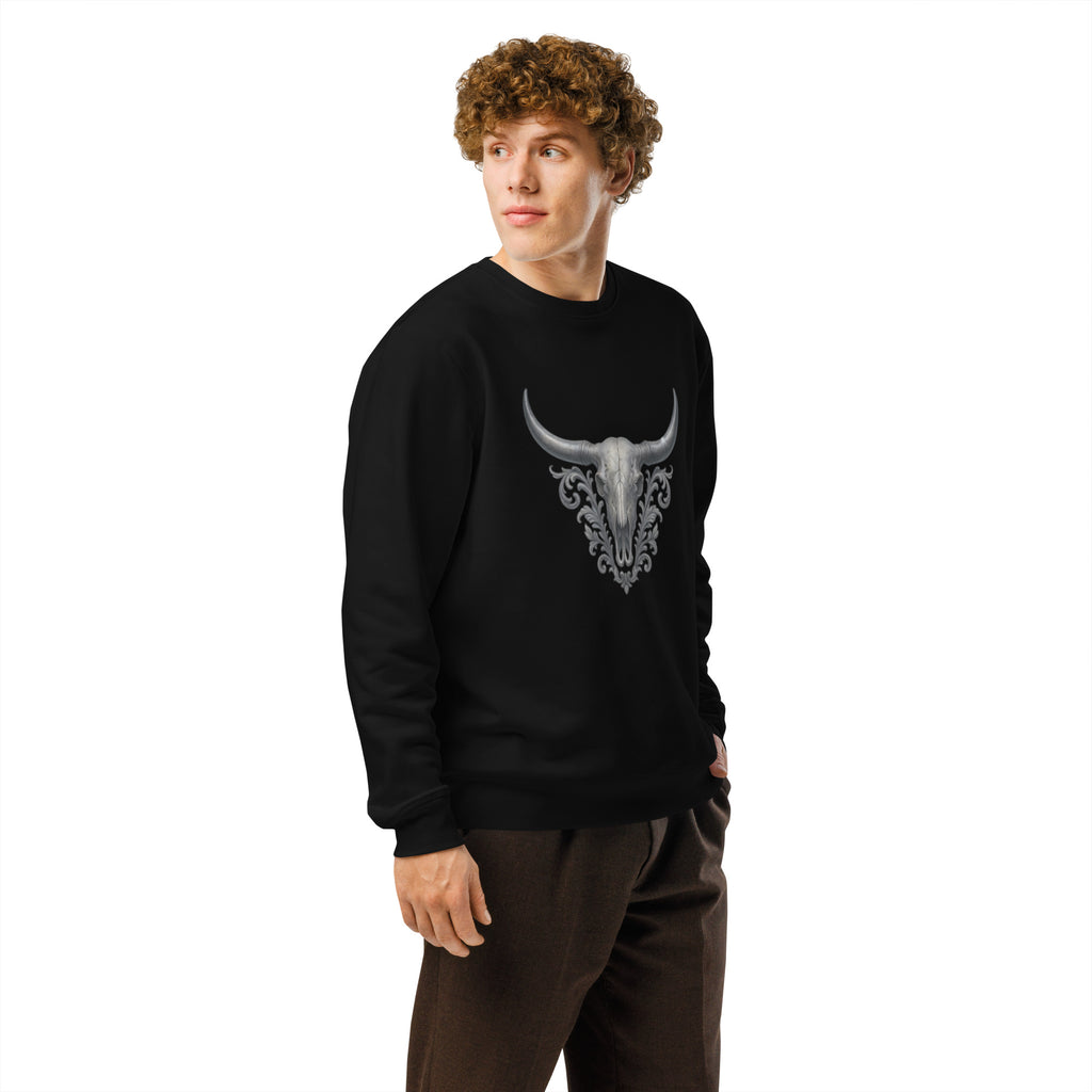 Person wearing a black sweatshirt with a bull skull design on a white background