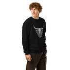 Person wearing a black sweatshirt with a bull skull design on a white background