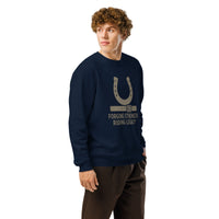 Person wearing a navy blue sweatshirt with a graphic design on a white background