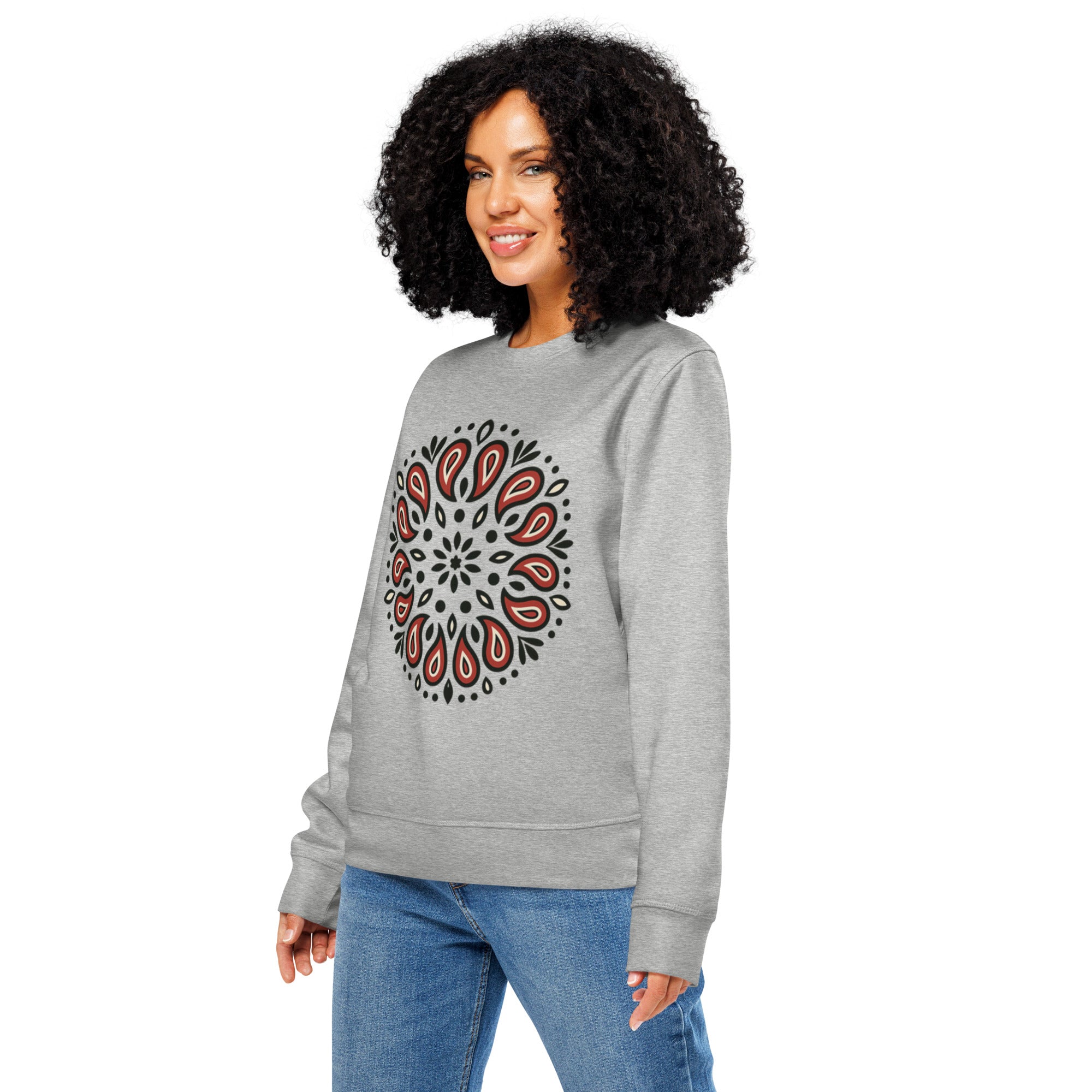 Woman wearing a gray sweatshirt with a circular pattern on a white background