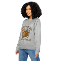 Woman wearing a gray sweatshirt with a graphic design and text on a white background