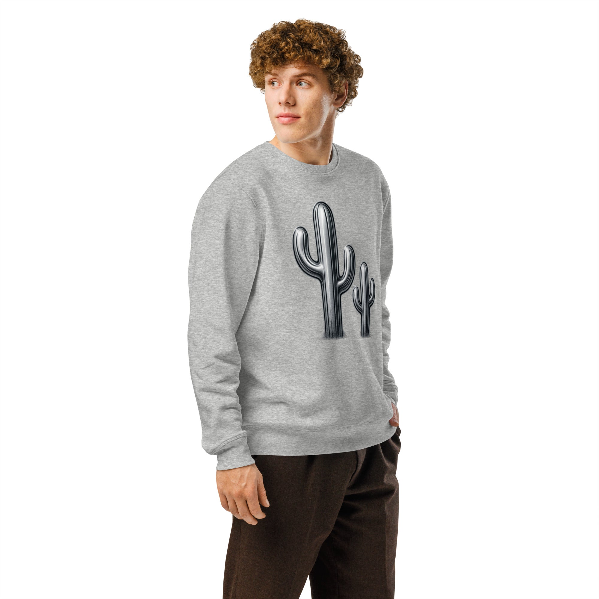 Person wearing a gray sweatshirt with a cactus design on a white background