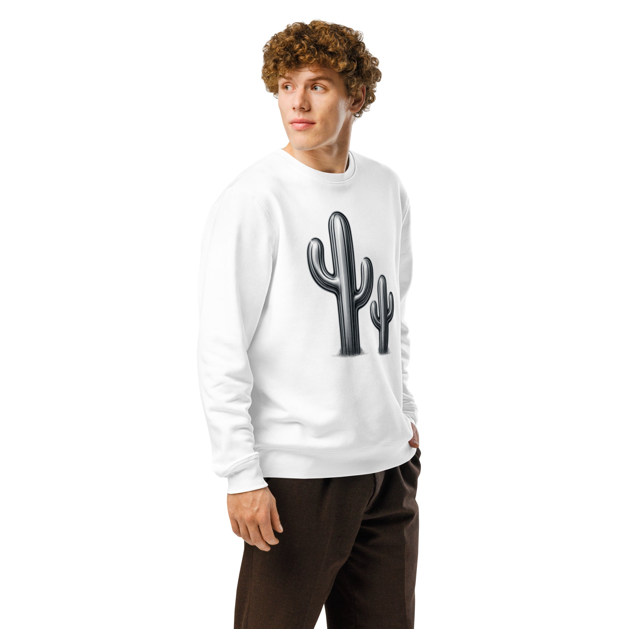 Person wearing a white sweatshirt with a cactus design on a white background