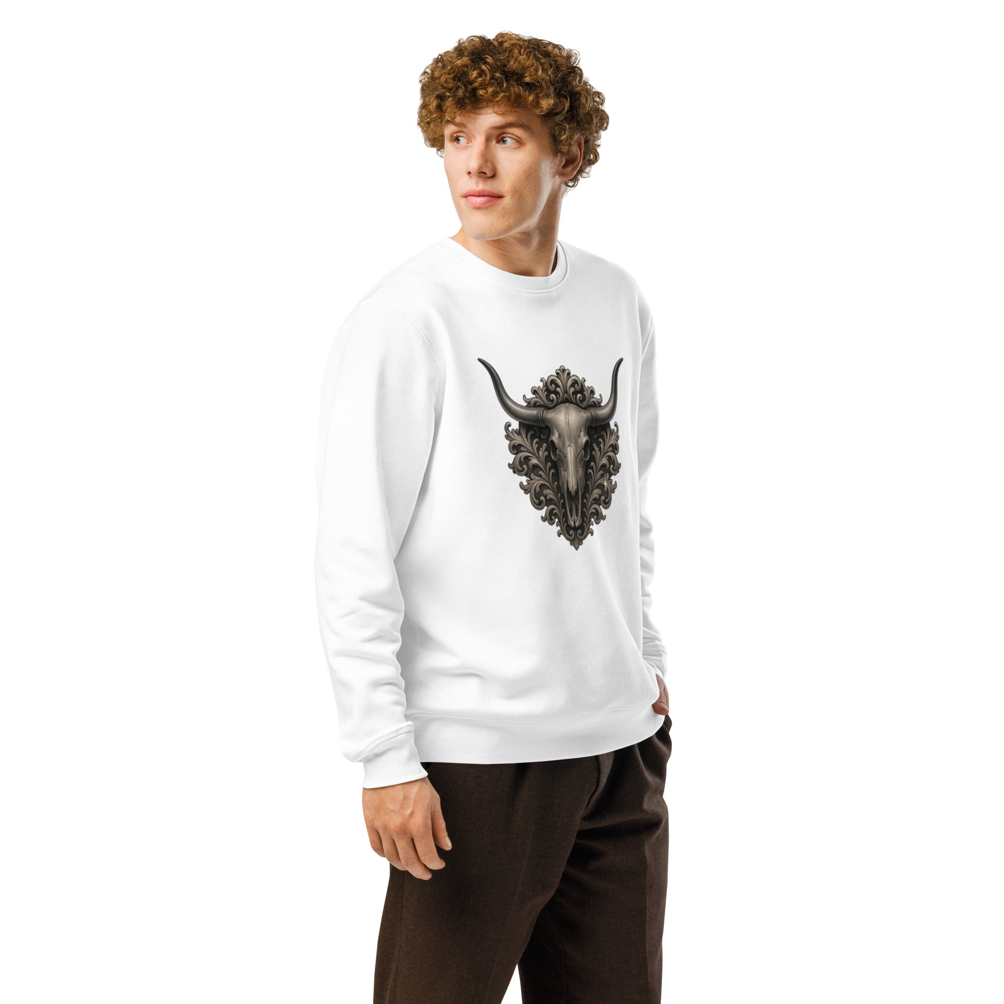 Person wearing a white sweatshirt with a bull skull design on a white background